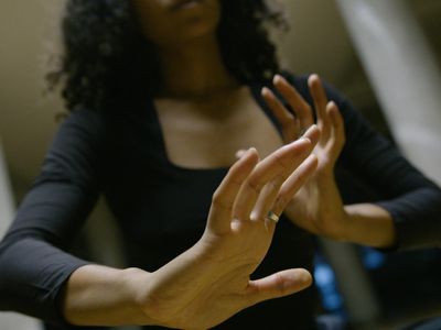 Close up of hands performing a gentle movement